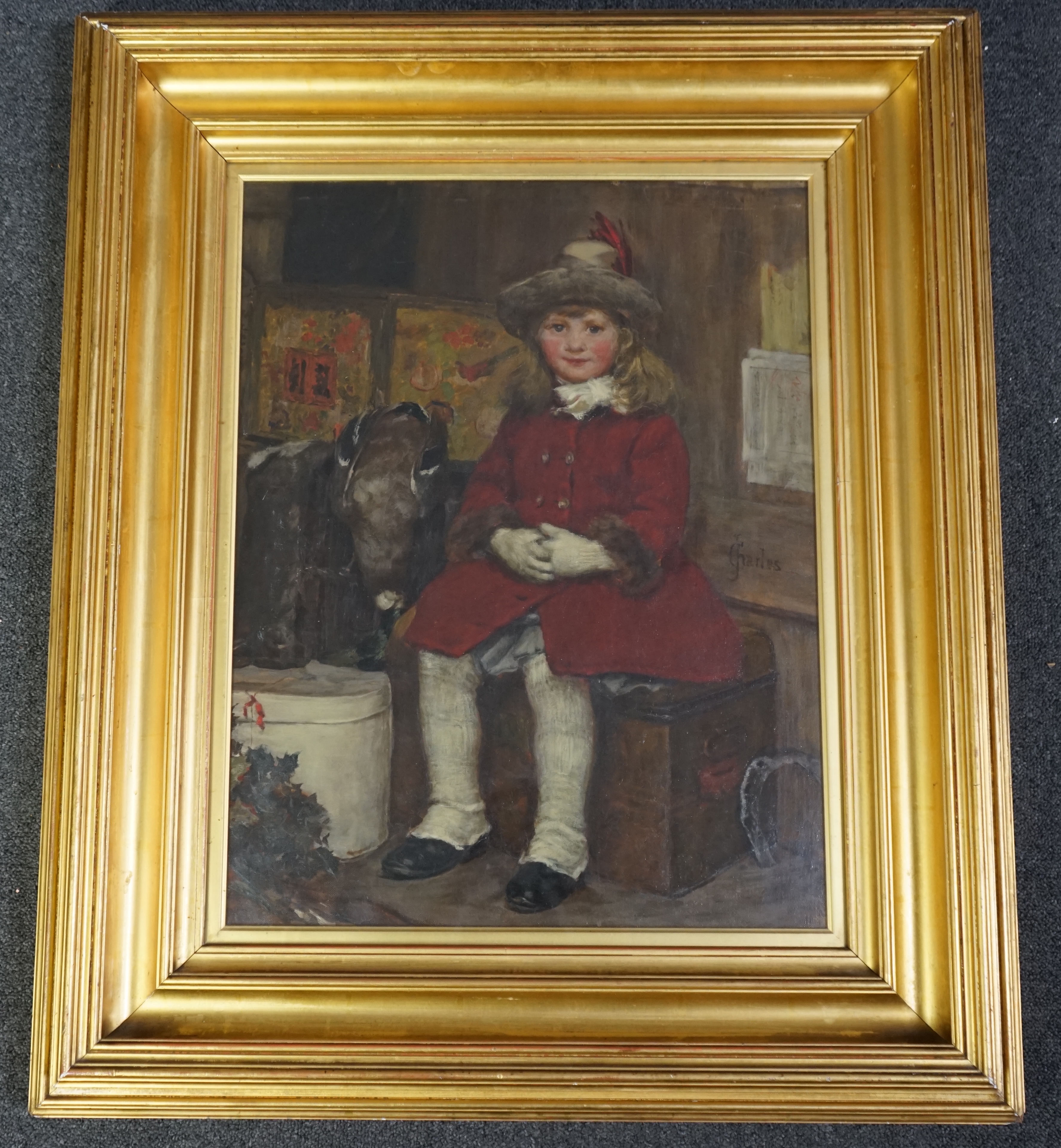 James Charles (British, 1851-1906), Seated child in a red coat, oil on canvas, 56 x 43cm